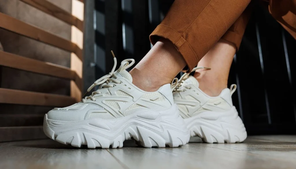 7 Clothing Mistakes Avoid on Your European Summer Trip scoopok.com All-White Sneakers
